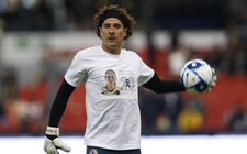 Images_170061_thumb_jugadores-america-calientan-portando-playera_0_1_958_596